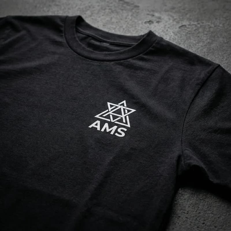 Custom AMS branded black tee with embroidered logo