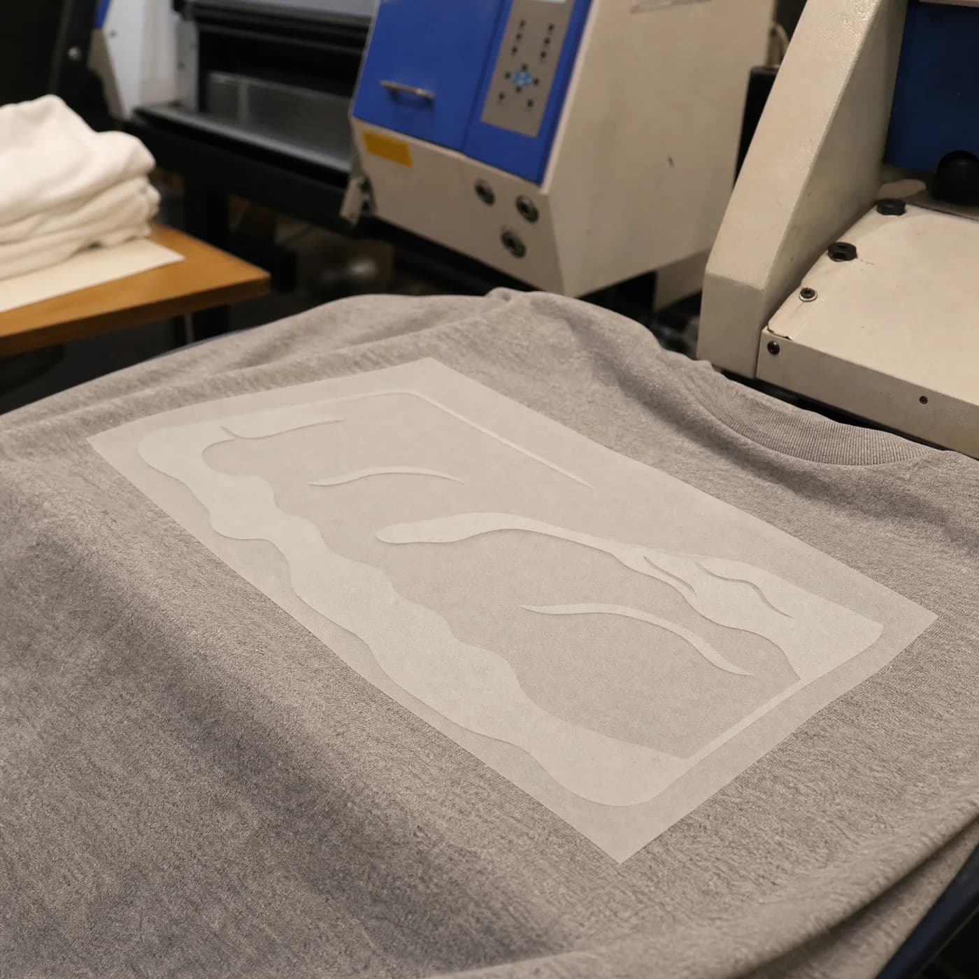 Performance tee fabric and transfer placement before heat pressing